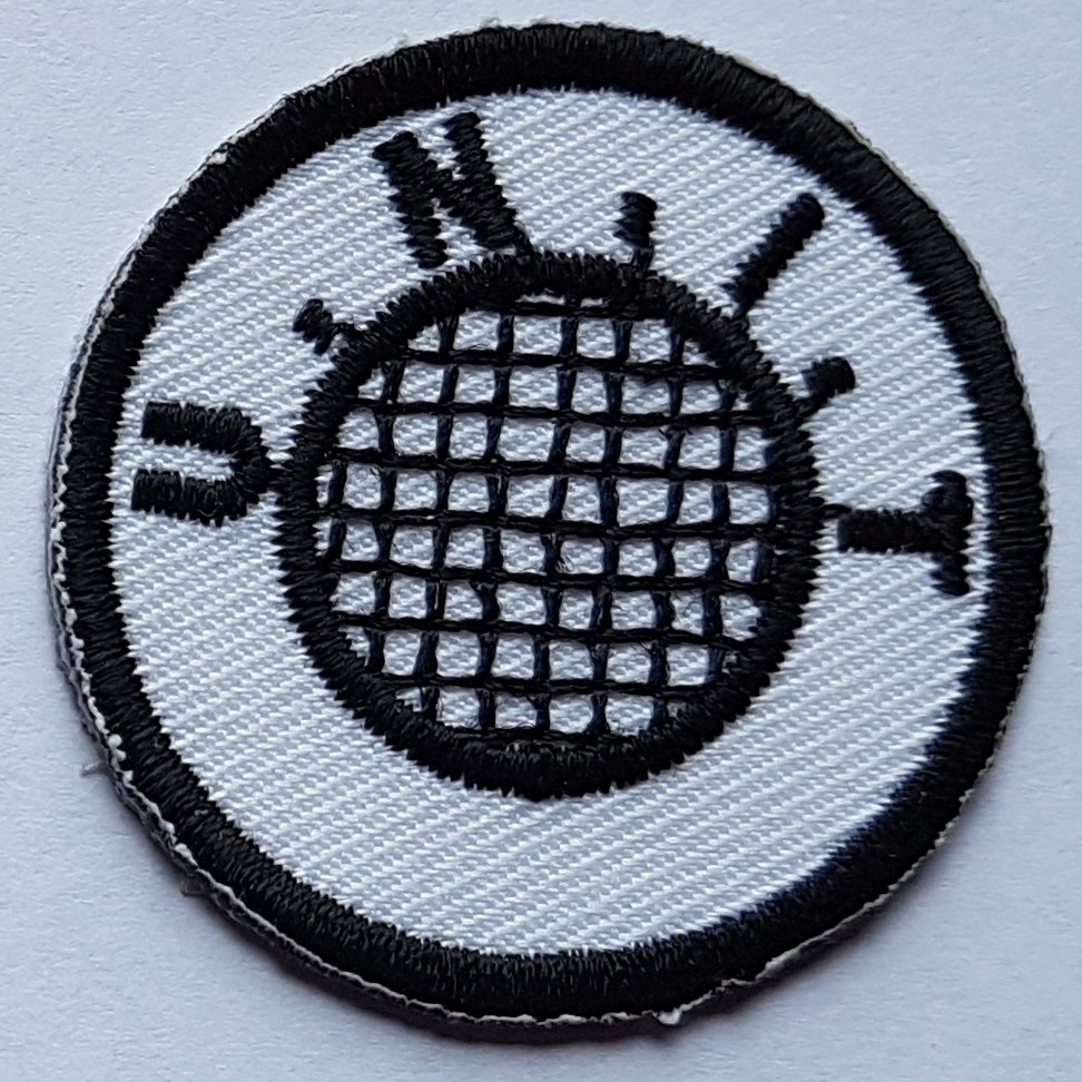 Picture of Badge-UNIT U. N. I. T. badge by artist Unknown from the BBC records and Tapes library